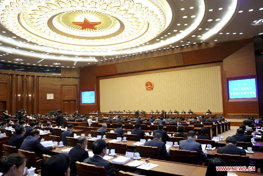 The opening meeting of the eighth session of the 12th National People's Congress (NPC) Standing Committee is held in Beijing, capital of China, April 21, 2014. Zhang Dejiang, chairman of the NPC Standing Committee, presided over the meeting. (Xinhua/Zhang Duo) 