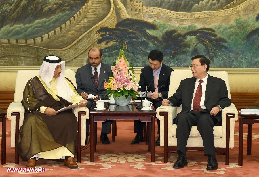 Zhang Dejiang (R), chairman of China's National People's Congress (NPC) Standing Committee, meets with Kuwaiti Prime Minister Sheikh Jaber Al-Mubarak Al-Hamad Al-Sabah in Beijing, capital of China, June 4, 2014
