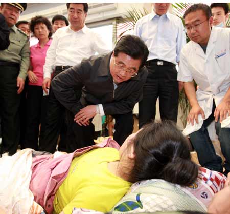 Chinese President Hu Jintao Friday went to Beichuan County of Mianyang City to visit people affected by the southwest China earthquake, encouraging them to be confident in overcoming hardships caused by the disaster.