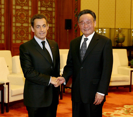 Wu Bangguo (R), chairman of the Standing Committee of China's National People's Congress, the country's top legislature, meets with French President Nicolas Sarkozy in Beijing, capital of China, Nov. 26, 2007. (Xinhua Photo)