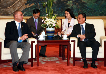 Wu Bangguo (R), chairman of the Standing Committee of the National People's Congress (NPC), China's top legislature, meets with David Thompson, Prime Minister of Barbados in Beijing, capital of China, May 5, 2008. 