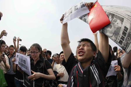 People shout slogans 